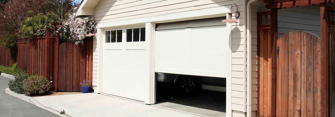 Fix Metal Garage Door Jerking in Quincy, Illinois